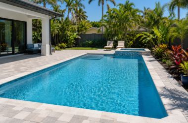 Resurfaced swimming pool in a Florida backyard